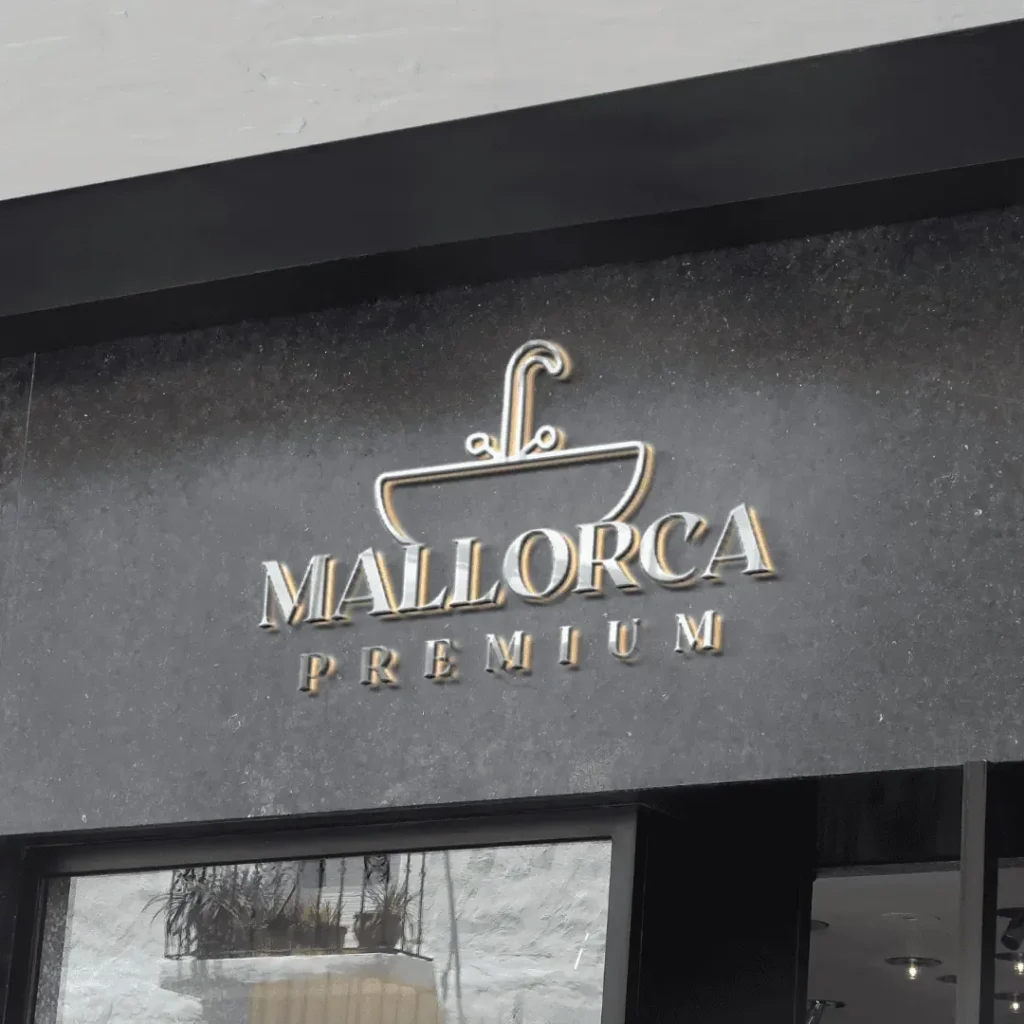שילוט חזית של Mallorca Premium בגימור זהב על חזית שחורה